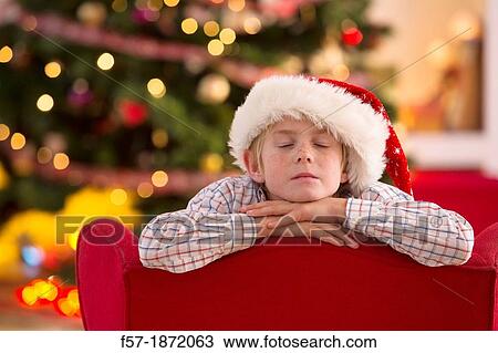 Young boy looking forward for Christmas View Large Photo Image Stock Image - Young boy looking forward for Christmas. Fotosearch