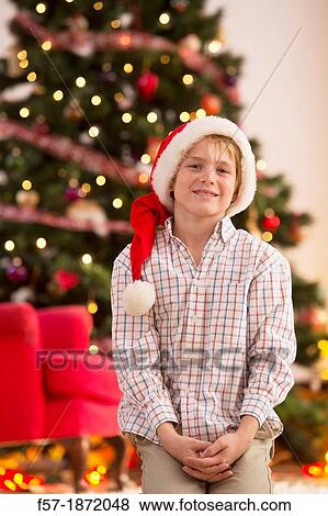 Young boy looking forward for Christmas View Large Photo Image Stock Photo - Young boy looking forward for Christmas. Fotosearch