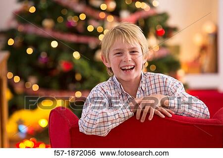 Young boy looking forward for Christmas View Large Photo Image Stock Photograph - Young boy looking forward for Christmas. Fotosearch