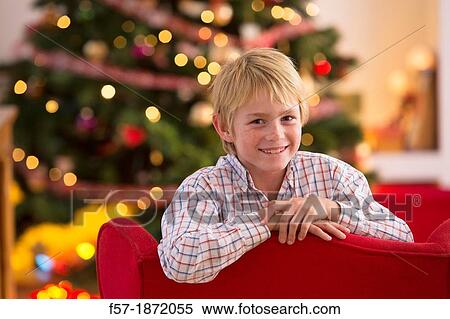 Young boy looking forward for Christmas View Large Photo Image Stock Photography - Young boy looking forward for Christmas. Fotosearch