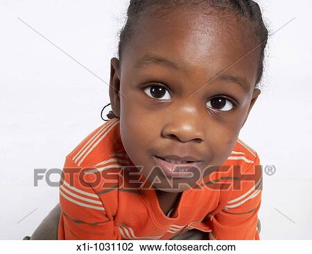 Young Boy Looking into Camera View Large Photo Image Stock Image - Young Boy Looking into Camera. Fotosearch