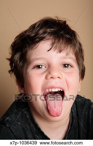 Young boy making faces View Large Photo Image Stock Photo - Young boy making faces. Fotosearch
