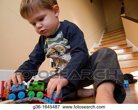 Young boy plays in Providence, Rhode Island, United States View Large Photo Image Stock Photo - Young boy plays in Providence, Rhode Island, United States. Fotosearch
