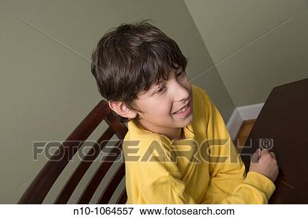 Stock Photo - Young boy posing. Fotosearch