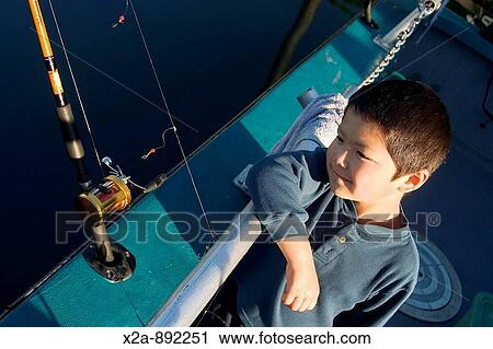 YOUNG BOY SALT WATER FISHING KODIAK ISLAND ALASKA View Large Photo Image Stock Image - YOUNG BOY SALT WATER FISHING KODIAK ISLAND ALASKA. Fotosearch