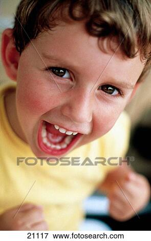 Young boy shouting View Large Photo Image Stock Photo - Young boy shouting. Fotosearch