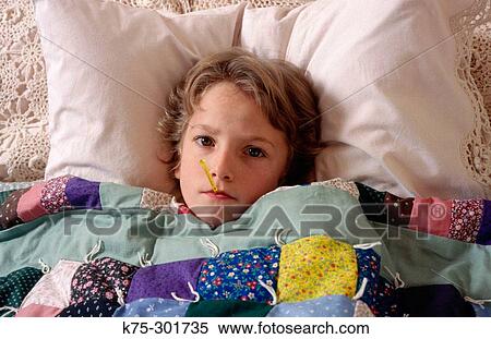 young boy sick in bed View Large Photo Image Stock Photography - young boy sick in bed. Fotosearch
