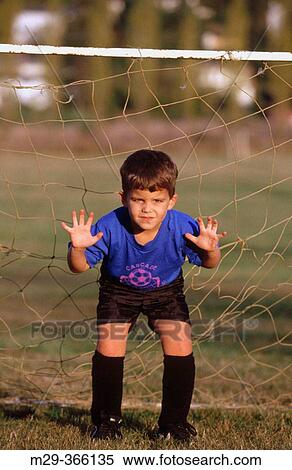 Young boy soccer goalie. View Large Photo Image Stock Photography - Young boy soccer goalie.. Fotosearch
