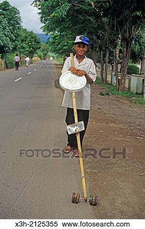 young boy, Sumatra island, Republic of Indonesia, Southeast Asia and Oceania. View Large Photo Image Stock Photography - young boy, Sumatra island, Republic of Indonesia, Southeast Asia and Oceania.. Fotosearch