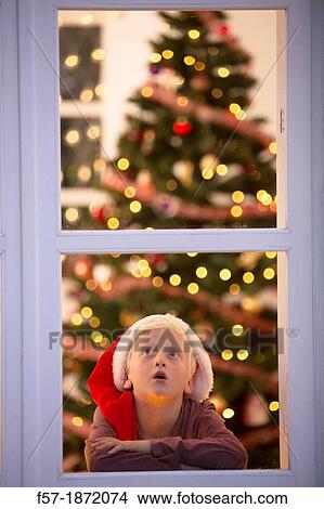 Young boy waiting for santa claus View Large Photo Image Picture - Young boy waiting for santa claus. Fotosearch