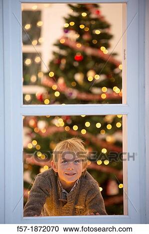 Young boy waiting for santa claus View Large Photo Image Stock Image - Young boy waiting for santa claus. Fotosearch