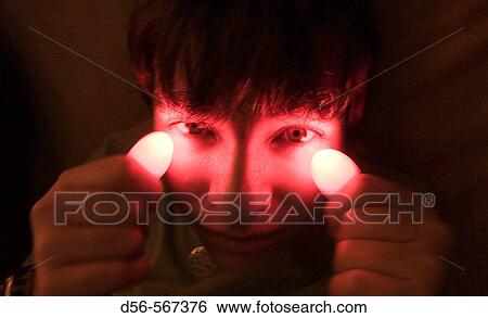 Young boy with red light thumbs View Large Photo Image Stock Photograph - Young boy with red light thumbs. Fotosearch
