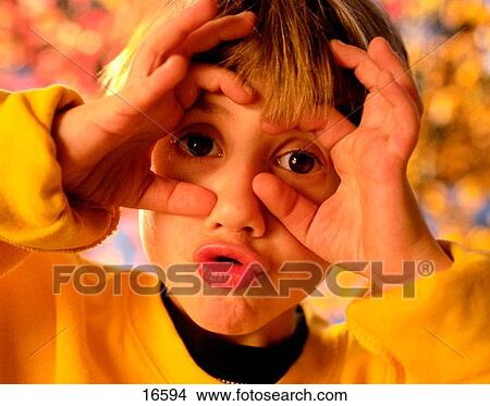 Young boy's big eyes View Large Photo Image Picture - Young boy's big eyes. Fotosearch