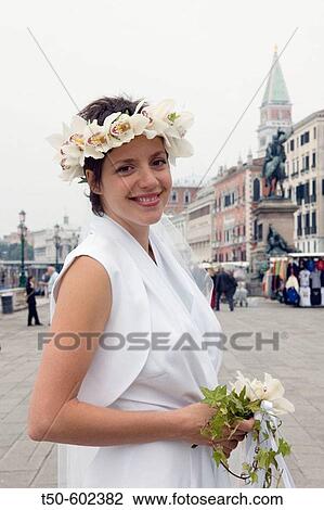Stock Image - Young bride with background of the Campanile Venice Italy. Fotosearch