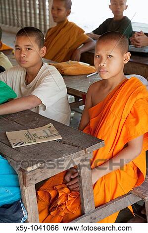 Young Buddhist Monks attending school in Cambodia View Large Photo Image Stock Photograph - Young Buddhist Monks attending school in Cambodia. Fotosearch
