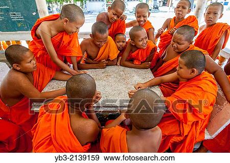 Young Buddhist Monks, Ko Samui, Thailand. View Large Photo Image Stock Photo - Young Buddhist Monks, Ko Samui, Thailand.. Fotosearch