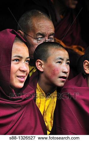 Young Buddhist monks watching Chaam Musk Dancing at Hemis Gompa. Jammu and Kashmir, India View Large Photo Image Stock Photo - Young Buddhist monks watching Chaam Musk Dancing at Hemis Gompa. Jammu and Kashmir, India. Fotosearch