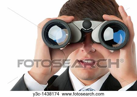 Young business man with binoculars View Large Photo Image Picture - Young business man with binoculars. Fotosearch
