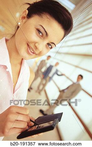Stock Photo - Young business woman. Fotosearch