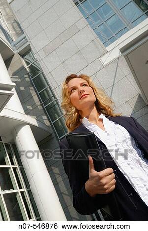 Stock Photograph - Young business woman walking.. Fotosearch