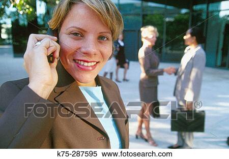 young businesswoman on cell phone View Large Photo Image Stock Photography - young businesswoman on cell phone. Fotosearch