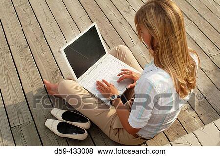 Young career woman, working on laptop computer. View Large Photo Image Stock Photo - Young career woman, working on laptop computer.. Fotosearch