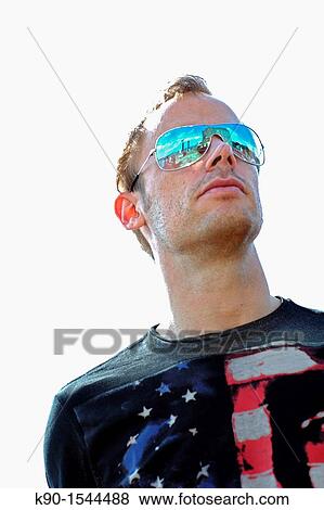 Young caucasian man, head and shoulders, with black Shirt, looking into the far distance, wearing sun glasses, Hamburg, Germany, Europe View Large Photo Image Stock Photo - Young caucasian man, head and shoulders, with black Shirt, looking into the far distance, wearing sun glasses, Hamburg, Germany, Europe. Fotosearch
