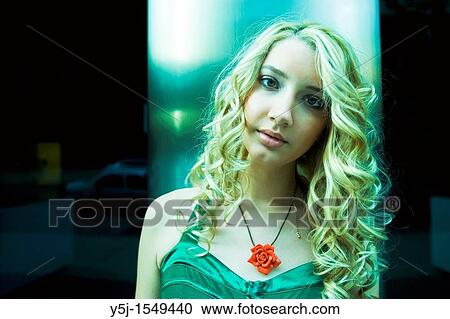 Young Caucasian woman tilting her head View Large Photo Image Stock Image - Young Caucasian woman tilting her head. Fotosearch
