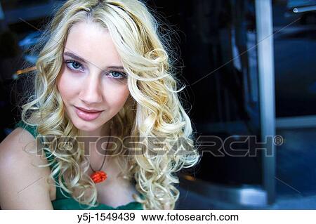 Young Caucasian woman tilting her head View Large Photo Image Stock Photo - Young Caucasian woman tilting her head. Fotosearch