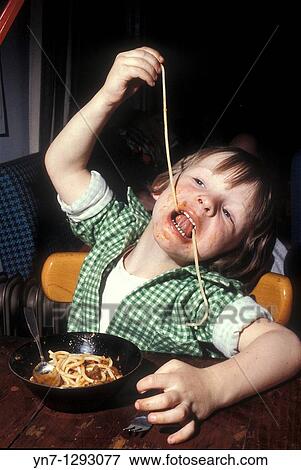 young child experimenting with spaghetti View Large Photo Image Stock Photo - young child experimenting with spaghetti. Fotosearch