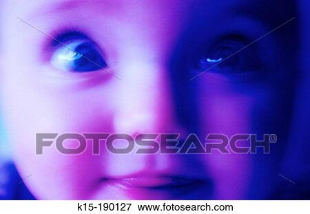 Young child's face in blue light View Large Photo Image Stock Photo - Young child's face in blue light. Fotosearch
