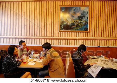Young Chinese People eating Burgers in a Mc Donalt Restaurant in Chinatown View Large Photo Image Stock Photograph - Young Chinese People eating Burgers in a Mc Donalt Restaurant in Chinatown. Fotosearch