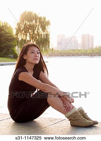 young chinese woman visiting the 2010 shanghai expo View Large Photo Image Stock Photography - young chinese woman visiting the 2010 shanghai expo. Fotosearch