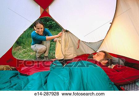 Stock Photo - Young couple at camp. Eagle River Valley. Southcentral Alaska. Fotosearch