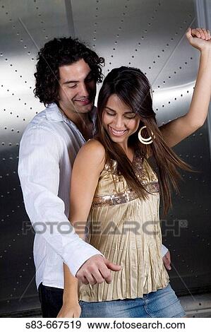 young couple dancing at club View Large Photo Image Stock Photo - young couple dancing at club. Fotosearch