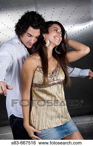 young couple dancing at club View Large Photo Image Stock Photograph - young couple dancing at club. Fotosearch