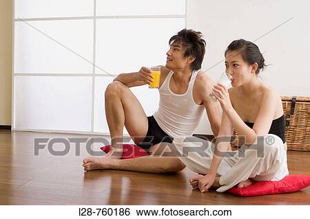 Young Couple Drinking at Home View Large Photo Image Stock Photograph - Young Couple Drinking at Home. Fotosearch