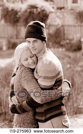 young couple embracing View Large Photo Image Stock Image - young couple embracing. Fotosearch