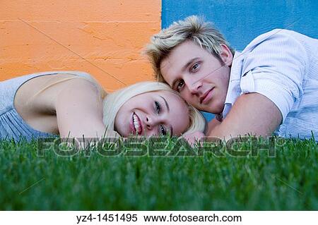young couple enjoying the day together durring engagement shoot View Large Photo Image Stock Photography - young couple enjoying the day together durring engagement shoot. Fotosearch