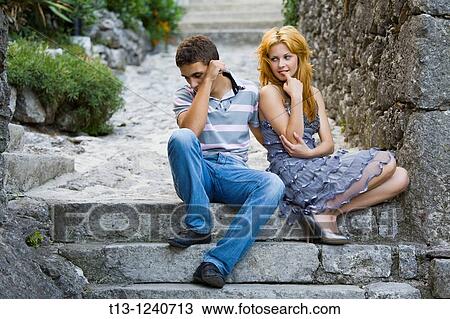 Stock Image - Young couple flirting. Fotosearch