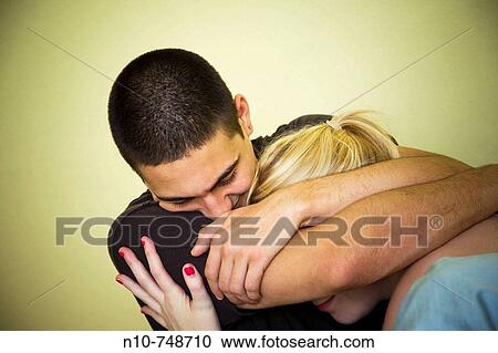Young couple in bed together. View Large Photo Image Stock Image - Young couple in bed together.. Fotosearch