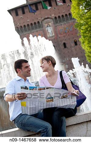 Young couple in front of the Castello Sforzesco, Milan, Italy View Large Photo Image Stock Photo - Young couple in front of the Castello Sforzesco, Milan, Italy. Fotosearch