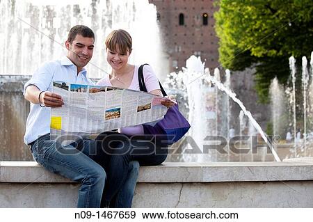 Young couple in front of the Castello Sforzesco, Milan, Italy View Large Photo Image Stock Photo - Young couple in front of the Castello Sforzesco, Milan, Italy. Fotosearch
