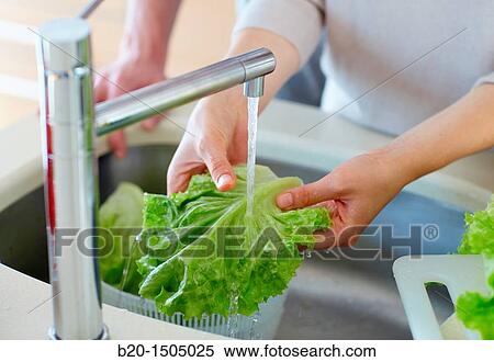 Young couple in kitchen View Large Photo Image Stock Photography - Young couple in kitchen. Fotosearch