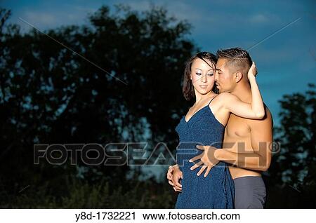Young couple in love - Asian woman, 20 years old, Korean Ethnicity, hispanic man, 22 years old, location Frio River near Leakey, Texas, USA View Large Photo Image Stock Image - Young couple in love - Asian woman, 20 years old, Korean Ethnicity, hispanic man, 22 years old, location Frio River near Leakey, Texas, USA. Fotosearch
