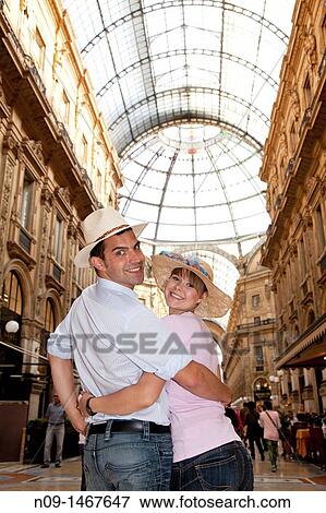 Stock Photo - Young couple in Milan.. Fotosearch