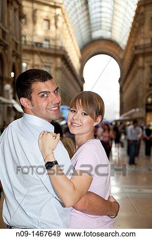 Young couple in Milan. View Large Photo Image Stock Photo - Young couple in Milan.. Fotosearch