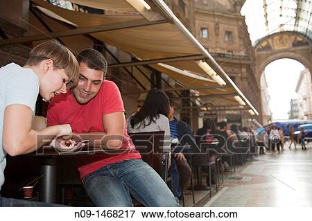 young couple in Milan View Large Photo Image Stock Photo - young couple in Milan. Fotosearch