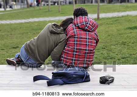 Young couple in Pla? a de Lesseps square, Barcelona, Catalonia, Spain View Large Photo Image Stock Image - Young couple in Pla? a de Lesseps square, Barcelona, Catalonia, Spain. Fotosearch