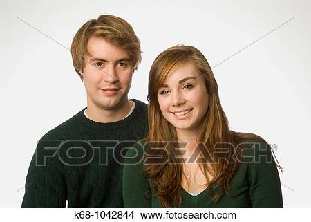 young couple in studio portrait View Large Photo Image Picture - young couple in studio portrait. Fotosearch